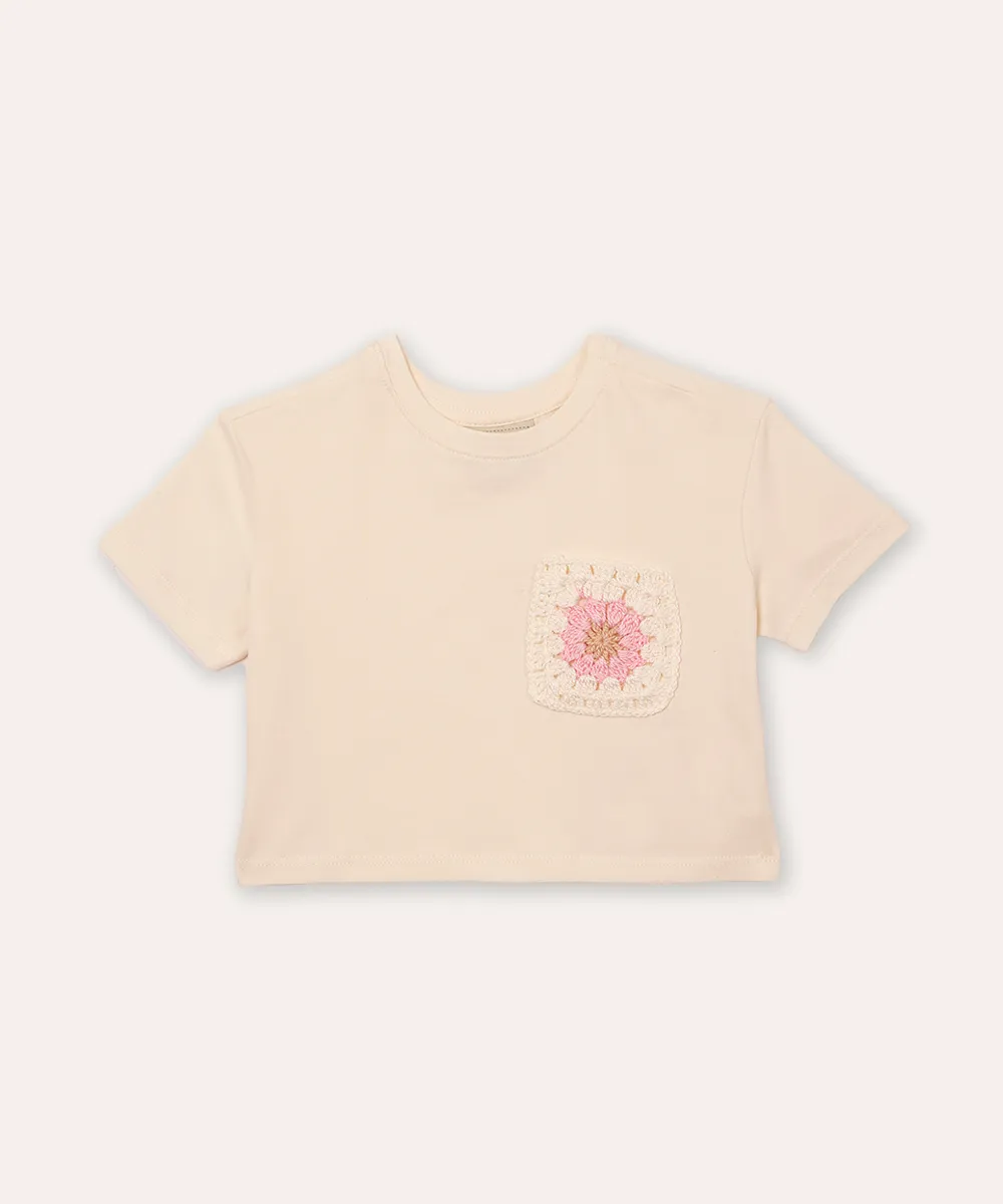 cropped infantil de algodão bolso floral bege