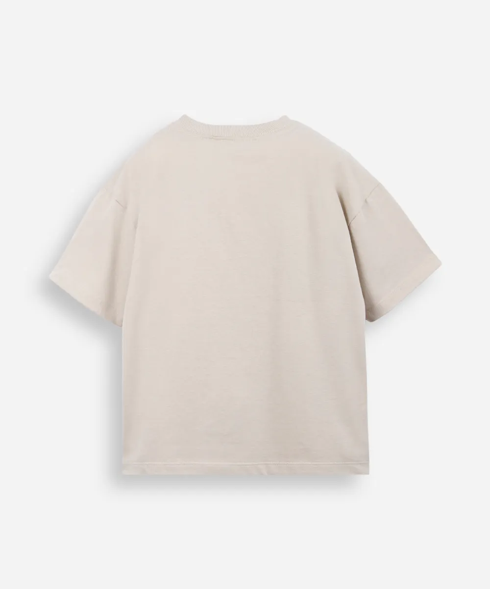 camiseta infantil de algodão estampa com relevo bege — foto 2